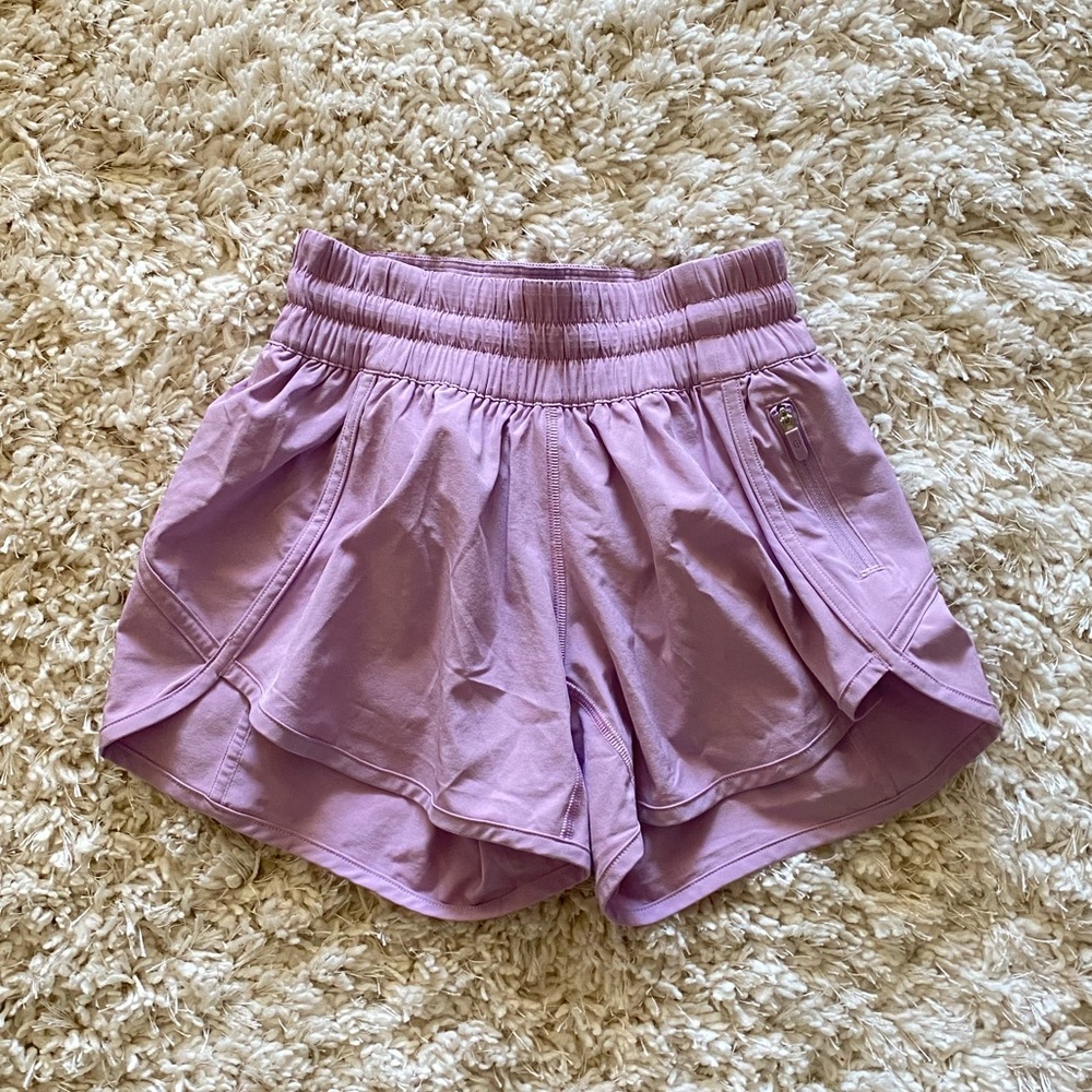 Lilac colored LULULEMON athletic shorts